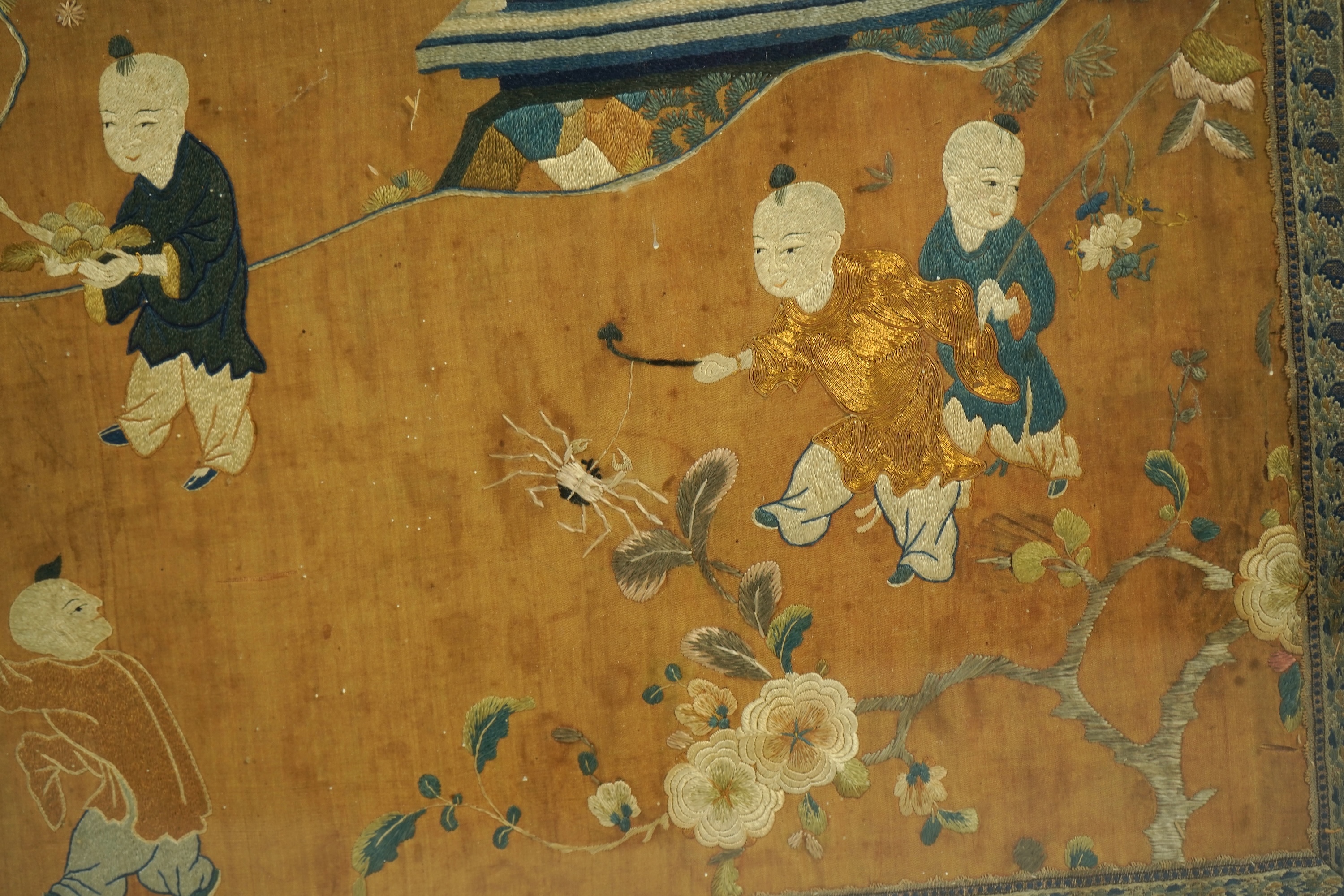 A large Chinese embroidered silk 'boys' panel, 19th century